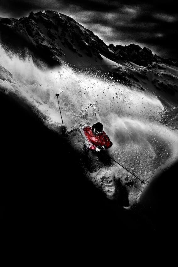 Red Powder Skiing Action by Tristan Shu — canvas wall art