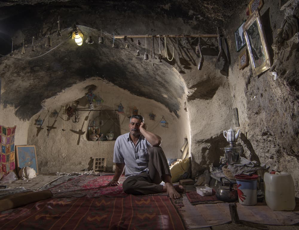 Pensive Man in Cave Home by Abbas Arabzadeh — canvas wall art