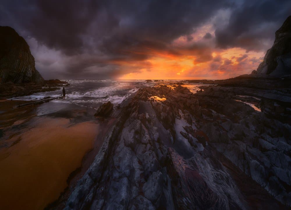 Dramatic Coastal Sunset by joanaduenas — canvas wall art