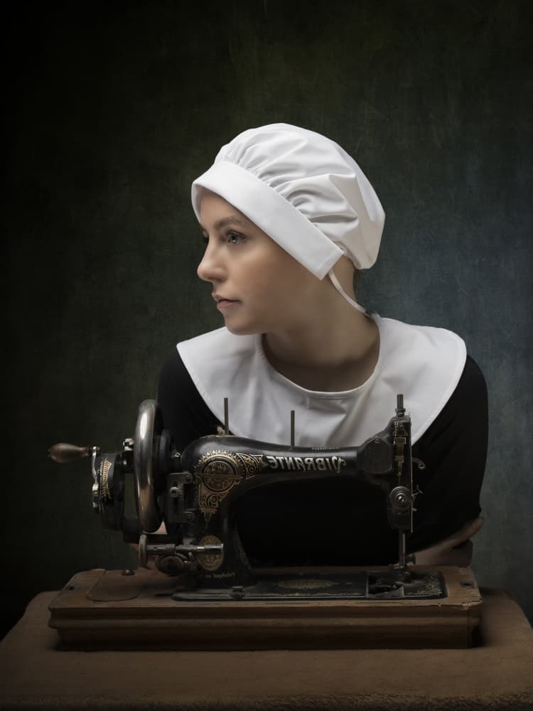 Pensive Woman Sewing by Ionel Onofras — canvas wall art