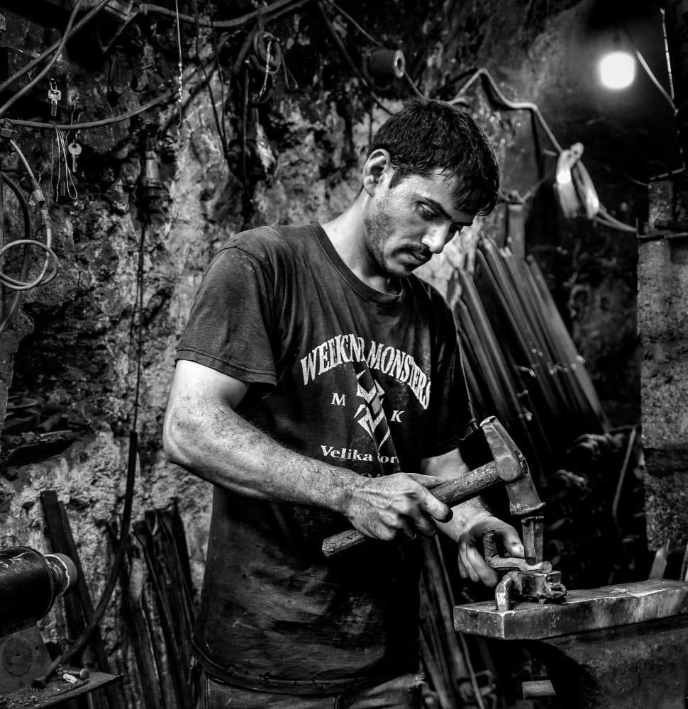 Blacksmith's Focused Craft by Bashar Alsofey — canvas wall art
