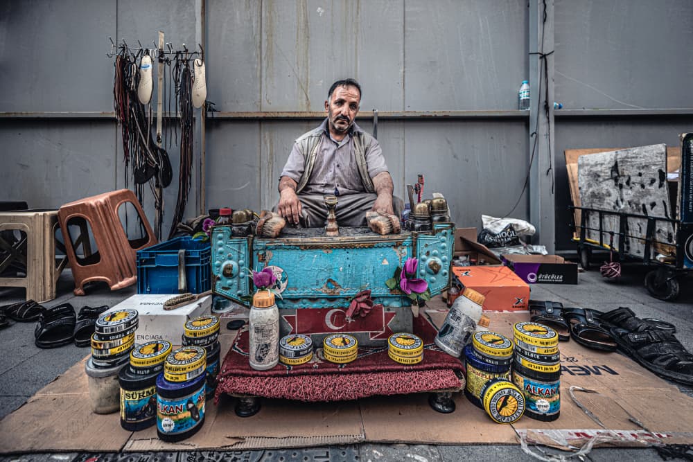 Street Shoeshiner Portrait by Marco Tagliarino — canvas wall art