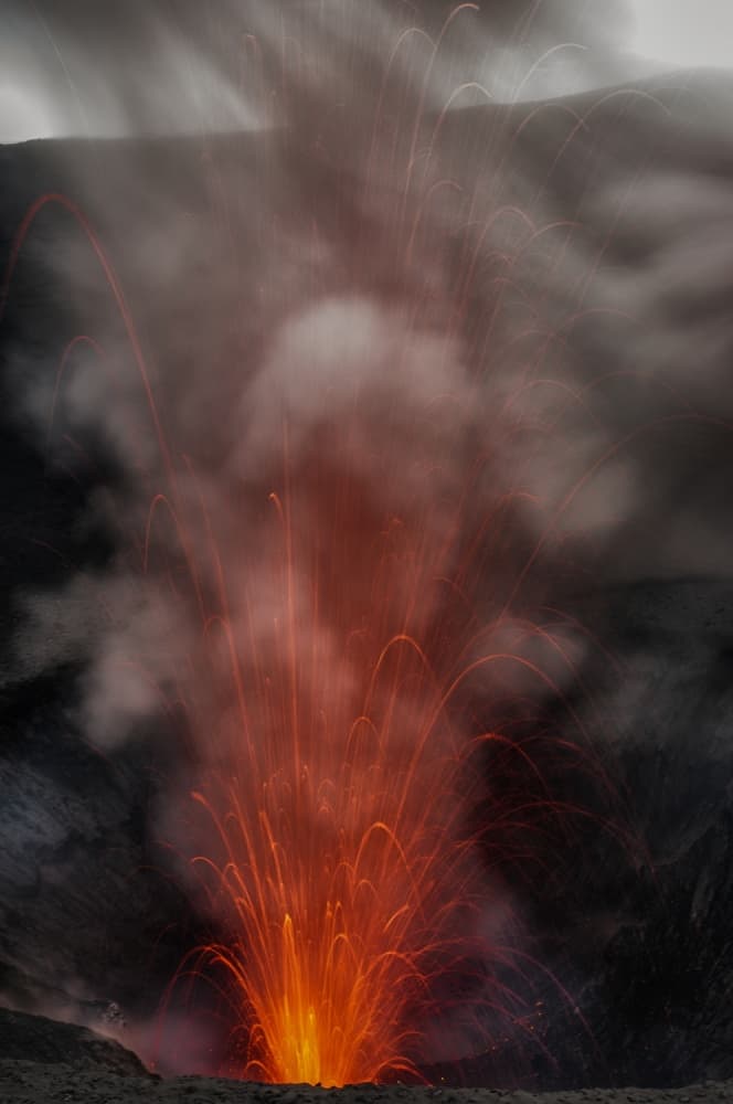 magma bubbles from mt. yasur by Pavol Stranak — canvas wall art
