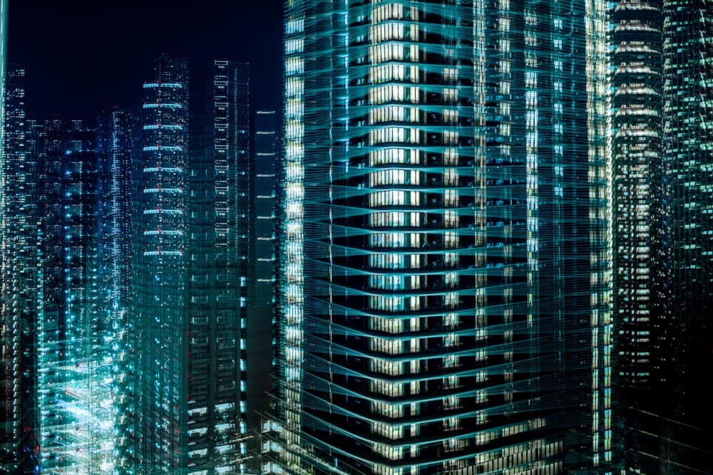 Glowing Urban Skyscrapers by Sasaki Makoto — canvas wall art