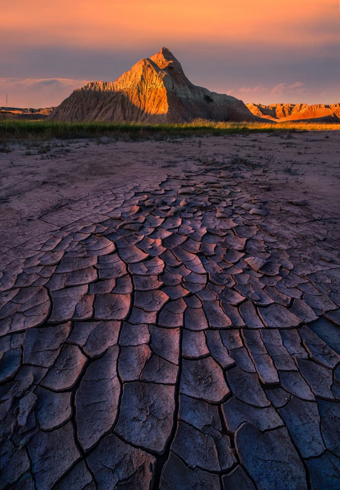 Golden Badlands Sunset by Ruiqing P. — canvas wall art