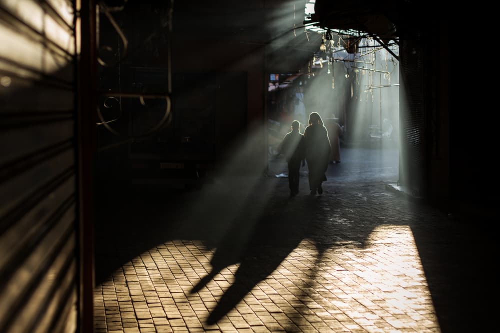 Sunlit Alley Figures by Dan Mirica — canvas wall art
