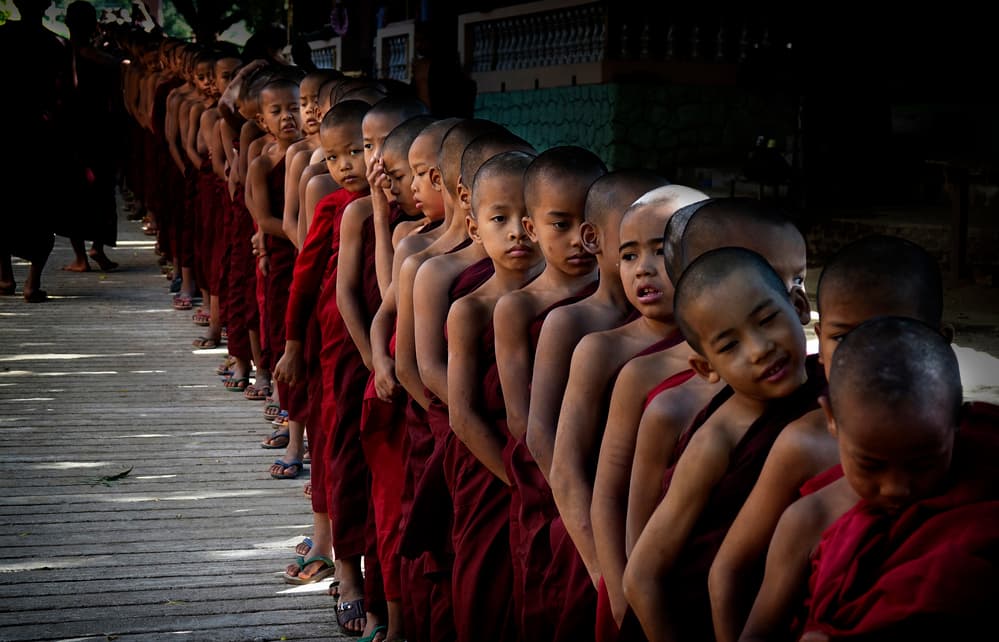 Young Monks Procession by Elena Molina — canvas wall art