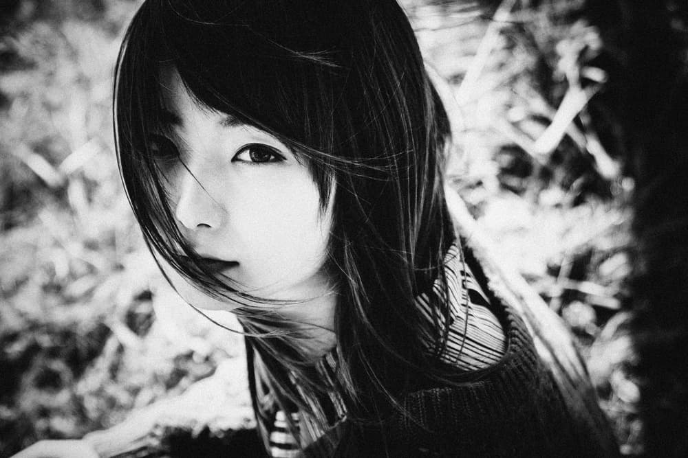 Pensive Young Woman by Nobu Ishijima — canvas wall art
