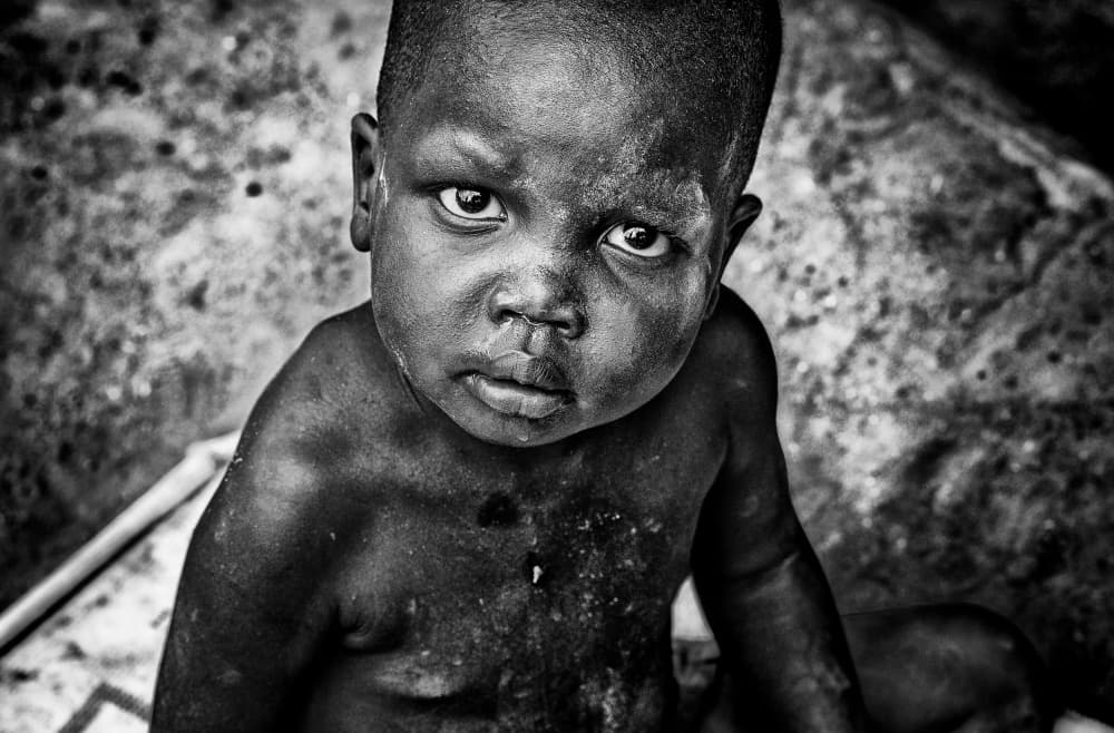 Intense Child Portrait by Joxe Inazio Kuesta Garmendia — canvas wall art