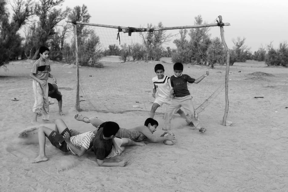 Desert Soccer Game by Foad Mirzaie — canvas wall art