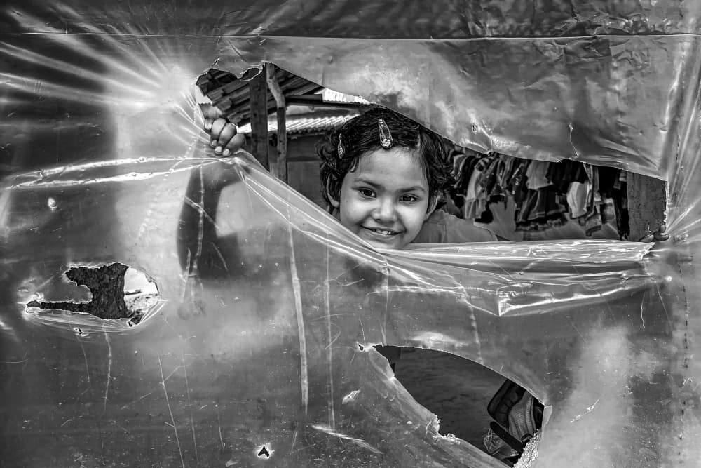 Joyful Child Peeking by Subhajit Das — canvas wall art