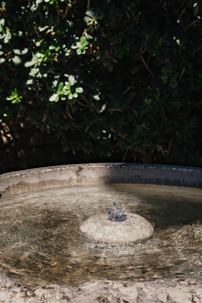 Tranquil Garden Fountain by Aimee Giles — canvas wall art