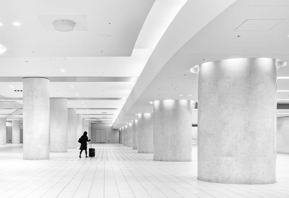 Solitary Traveler in Modern Hall by Haruyo Sakamoto — canvas wall art
