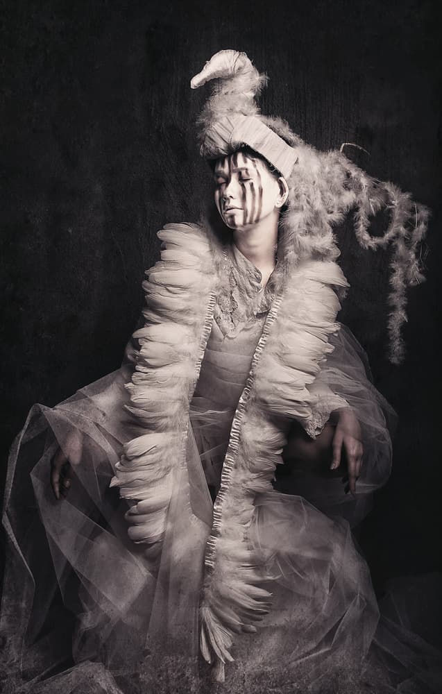Mysterious Feathered Woman by Hari Sulistiawan — canvas wall art