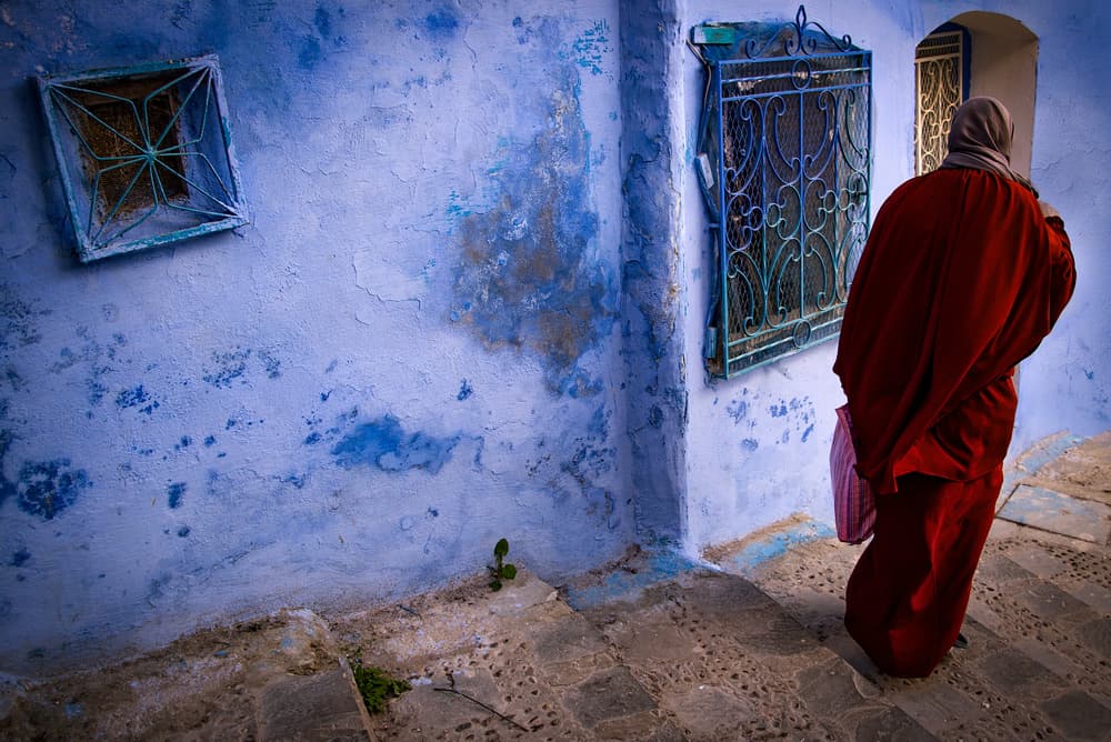 Red Robe Blue City by Linda Wride — canvas wall art