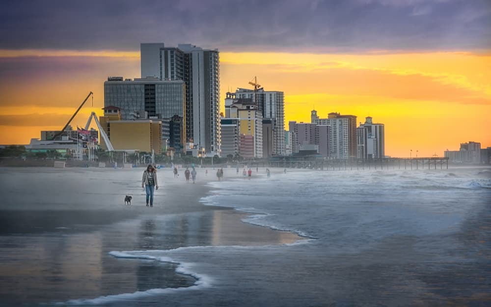 Coastal City Sunset Stroll by Jianping Yang — canvas wall art