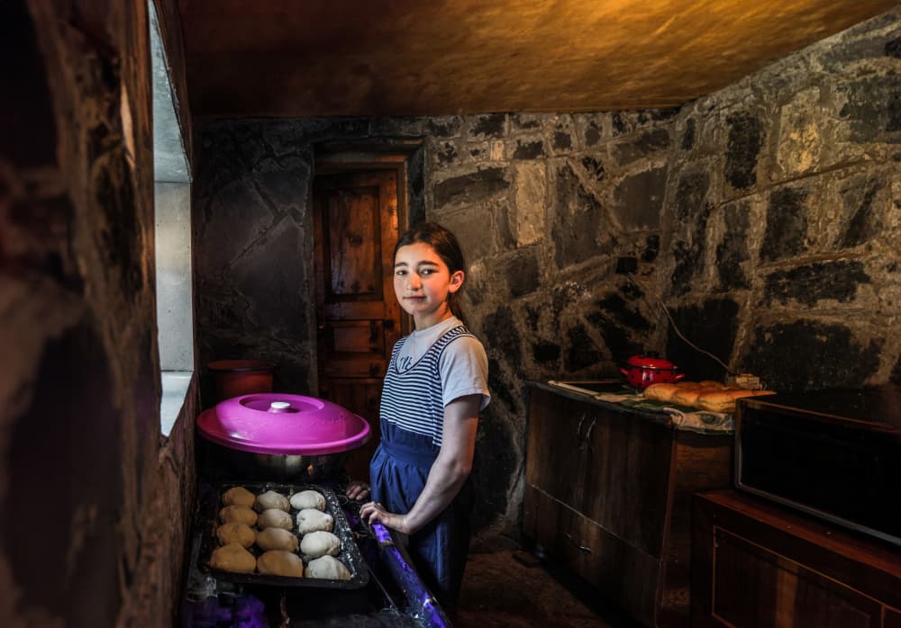Young Girl Baking by Corinne Spector — canvas wall art