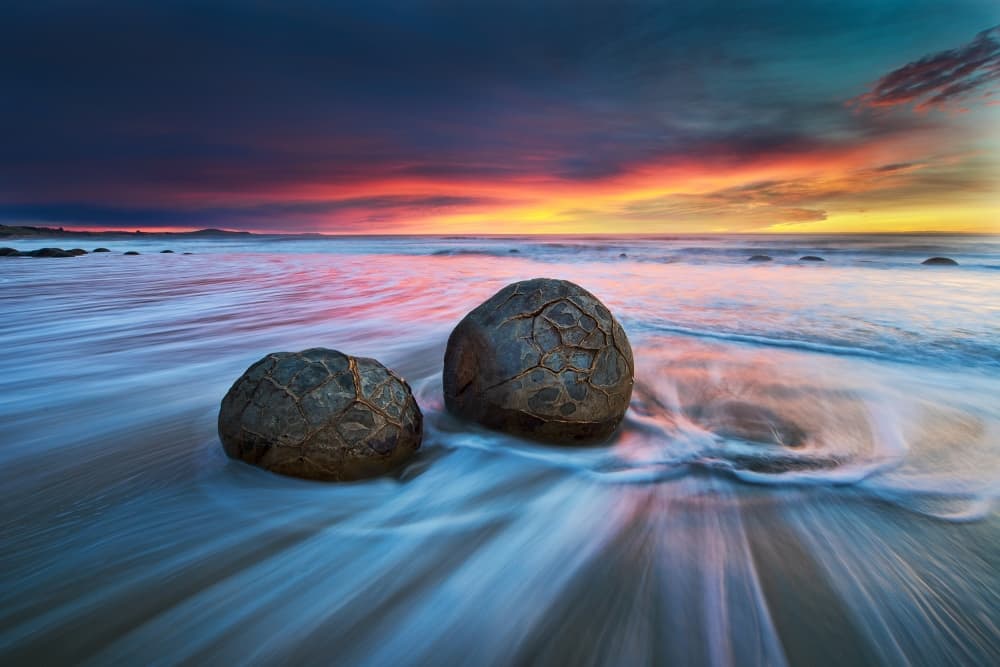 Moeraki Boulders Sunset by Yan Zhang — canvas wall art