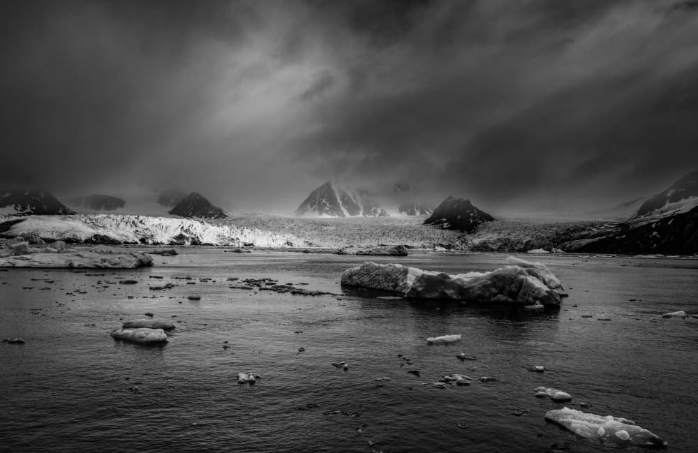 Glacier Under Dark Skies by Shobhit Chawla — canvas wall art