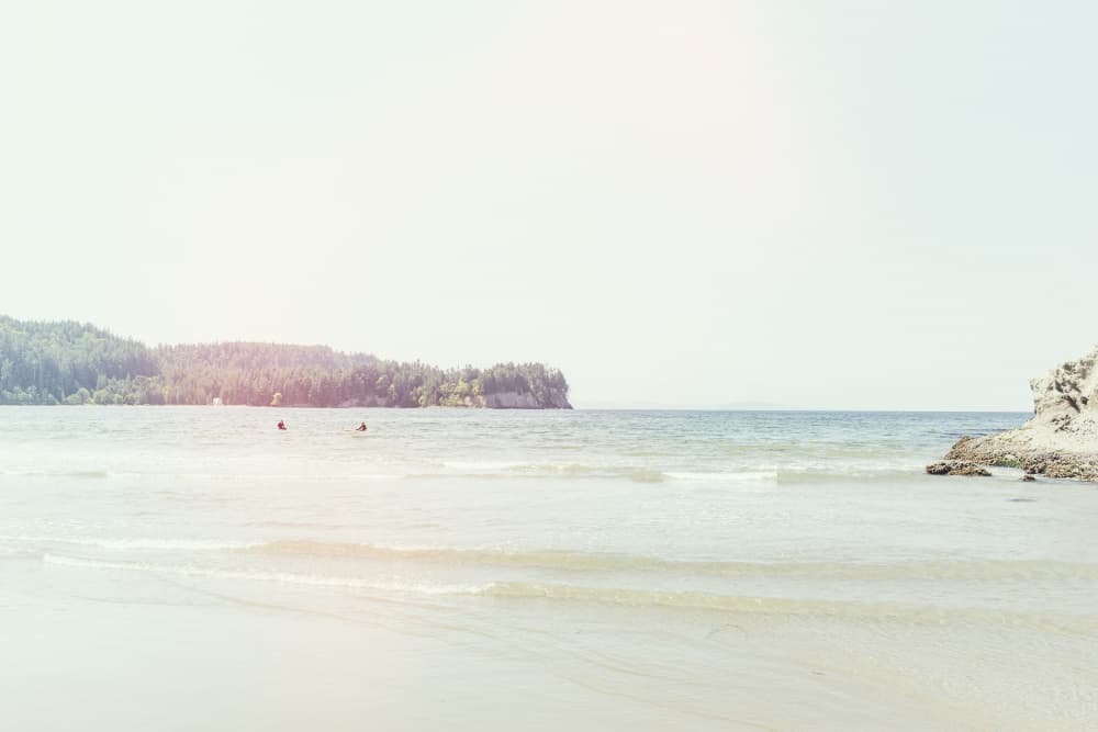 Serene Coastal Waters by Lynann Colligan — canvas wall art