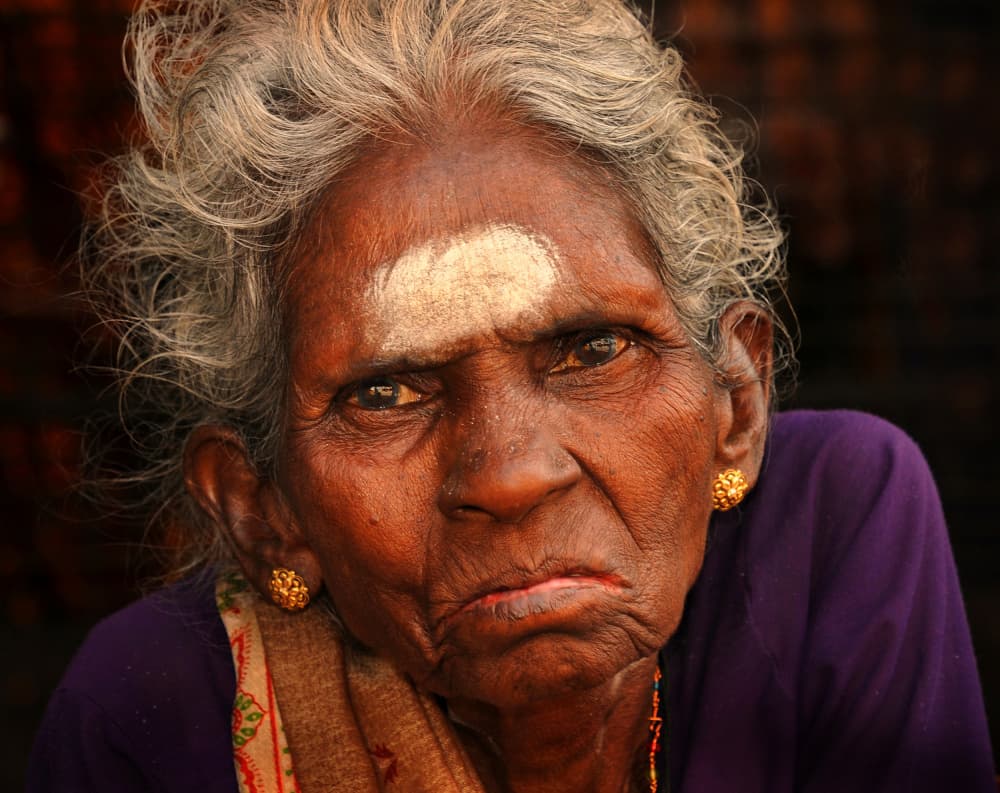 Woman's Intense Gaze by Lou Urlings — canvas wall art