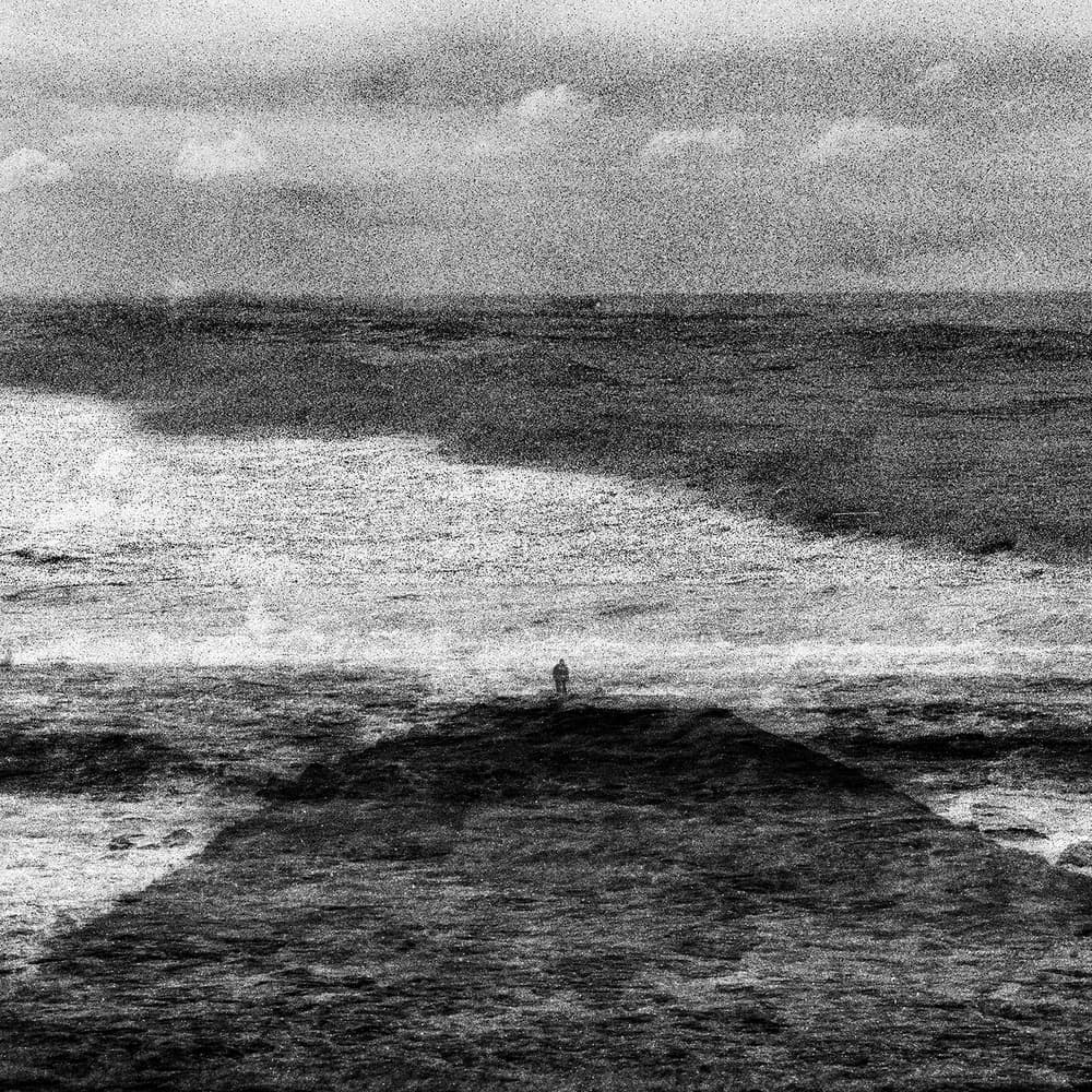 Solitary Figure Ocean by Paulo Abrantes — canvas wall art