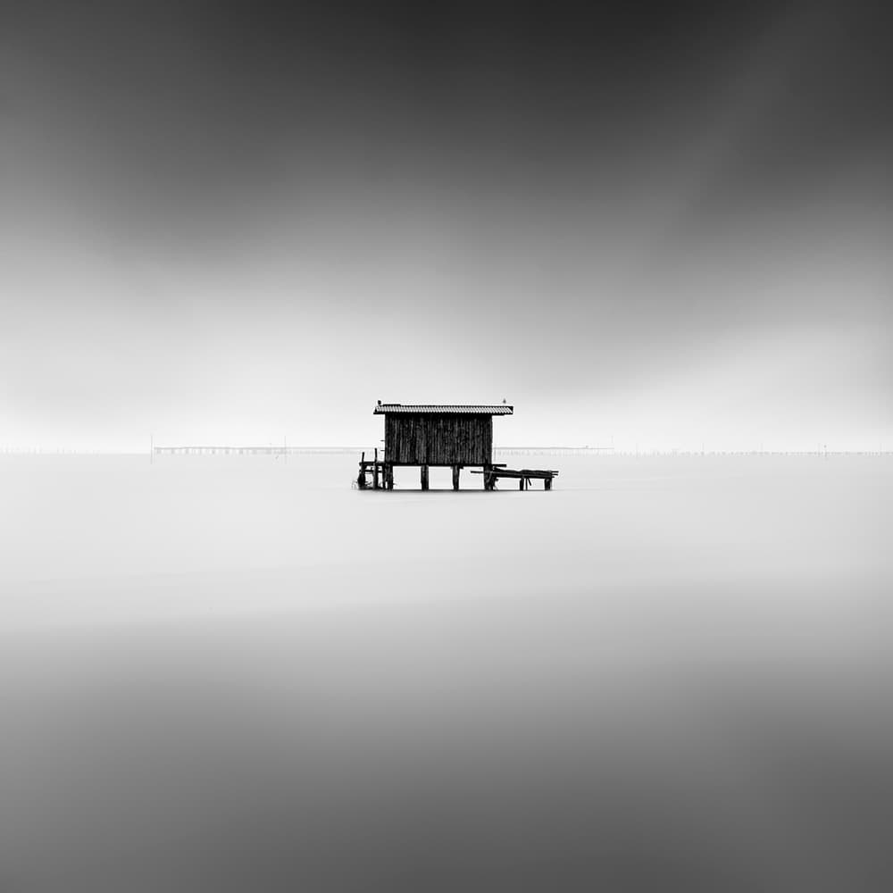 Serene Fishing Hut by George Digalakis — canvas wall art