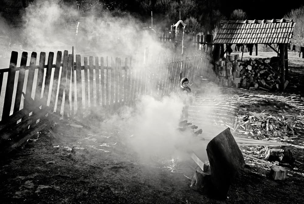 Child In Winter Smoke by Julien Oncete — canvas wall art