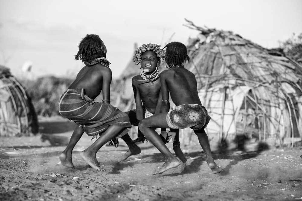 Children's Tribal Dance by Goran Jovic — canvas wall art