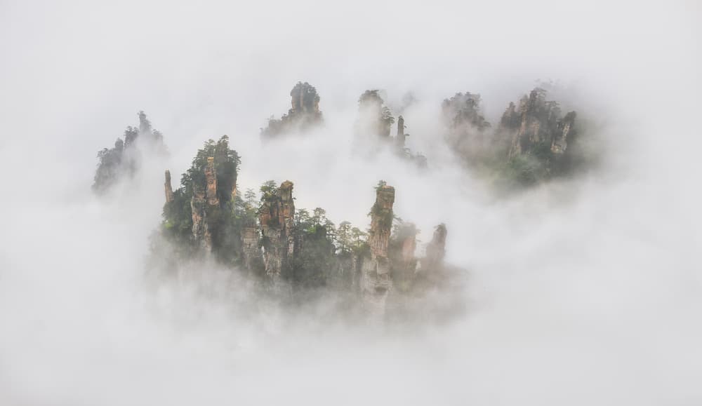 Misty Mountain Peaks by Roberto Marchegiani — canvas wall art