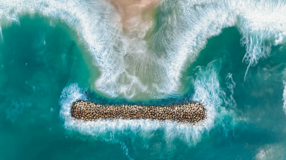 Aerial Ocean Breakwater by Ido Meirovich — canvas wall art