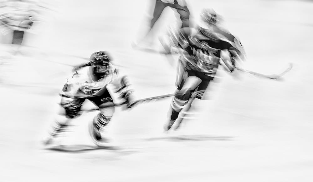 Fast Hockey Action by Henry Zhao — canvas wall art