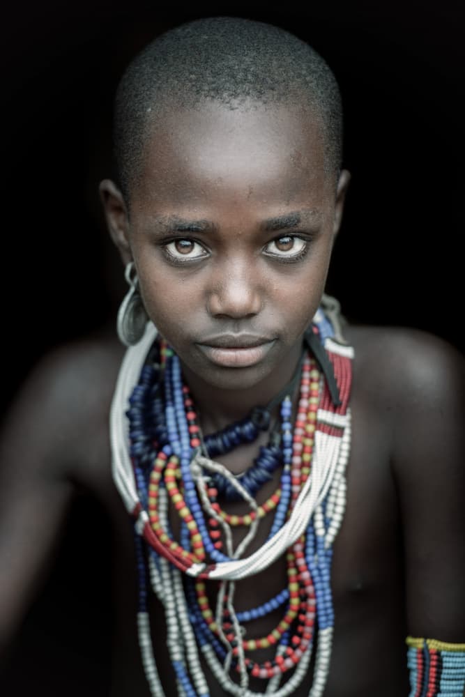 Tribal Girl's Gaze by Trevor Cole — canvas wall art