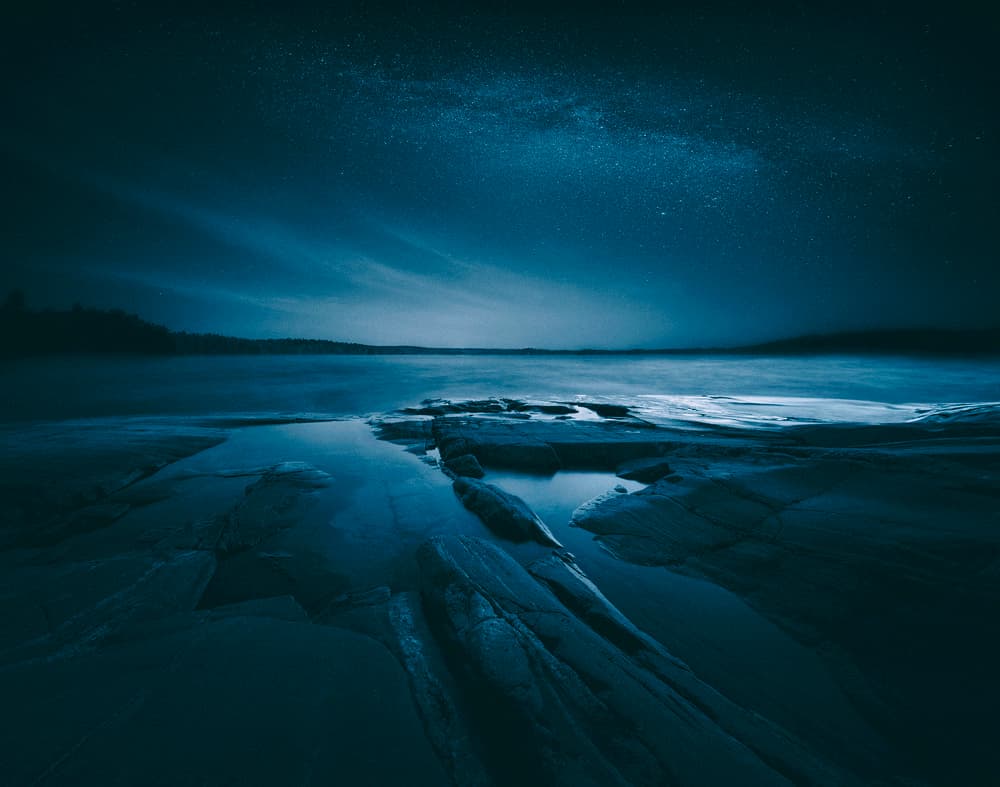 Tranquil Starry Night Lake by Mika Suutari — canvas wall art