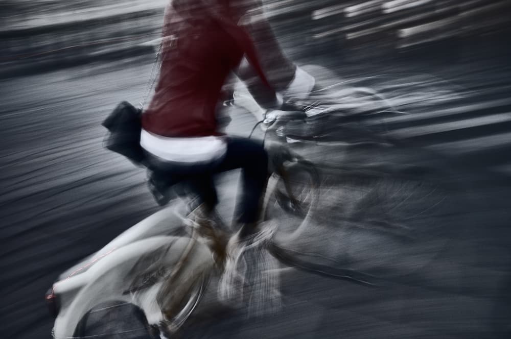 Blurred Urban Cyclist by Antonio Grambone — canvas wall art