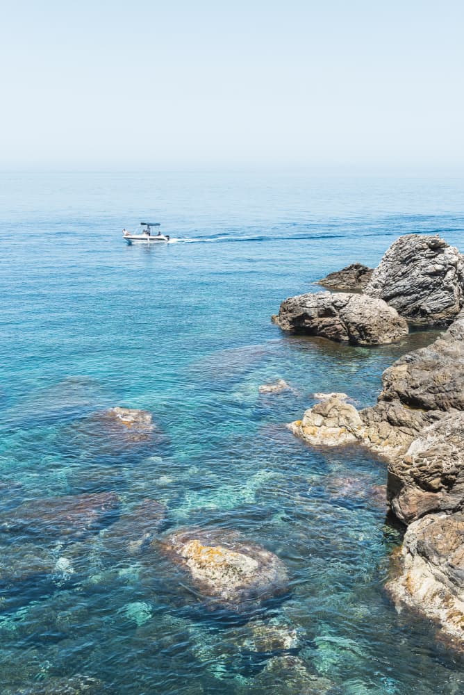 Serene Blue Coastal Boat by Photolovers — canvas wall art