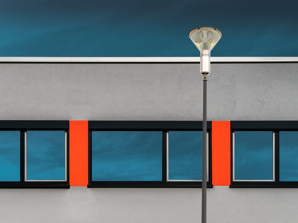 Modern Blue Orange Facade by Luc Vangindertael (laGrange) — canvas wall art