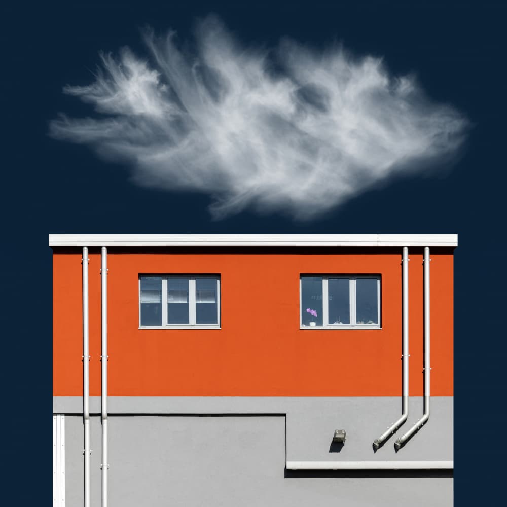 Cloud Over Orange Building by Andrea Comari — canvas wall art