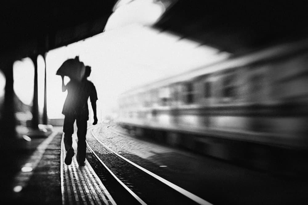 Lone Traveler Train Station by Sebastian Kisworo — canvas wall art