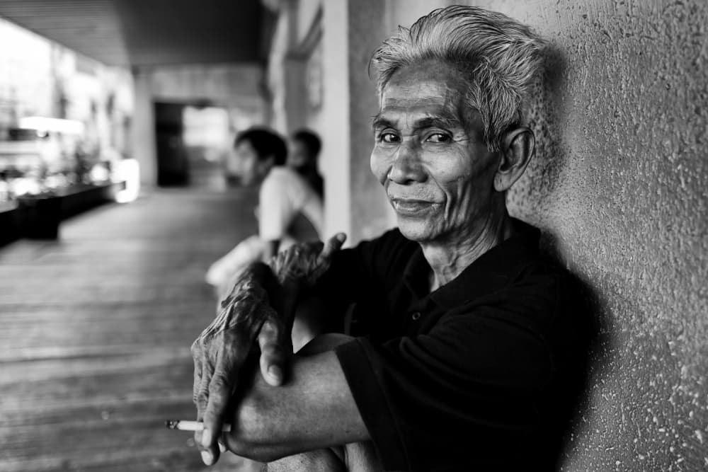 Smiling Elder Portrait by Kieron Long — canvas wall art