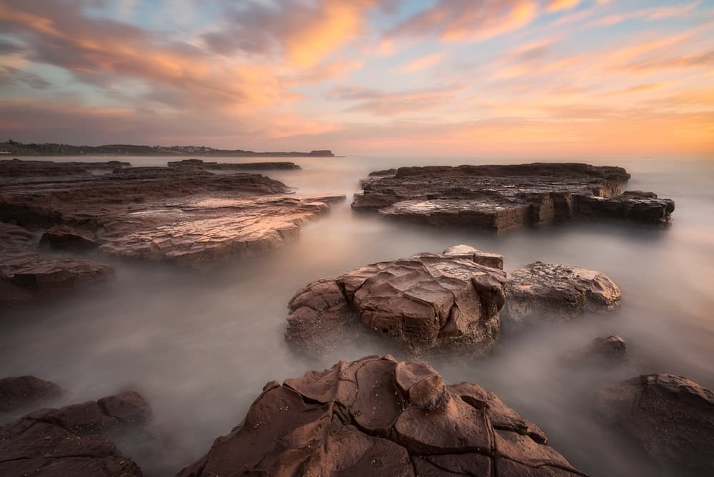Serene Coastal Sunset by Jingshu Zhu — canvas wall art