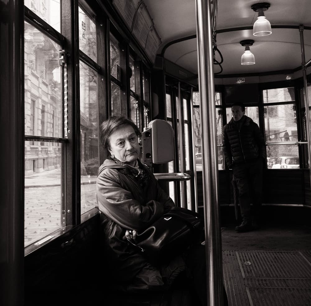 Pensive Woman Tram Ride by Yuri Shepelev — canvas wall art