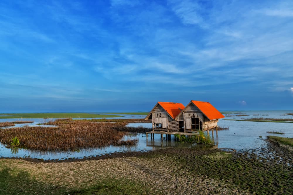 Peaceful Lake Stilt Houses by TWEE LIANG WONG — canvas wall art