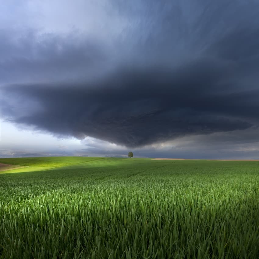 Approaching Storm Over Field by Nicolas Schumacher — canvas wall art