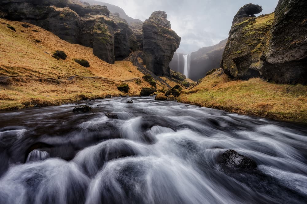 Flowing River Waterfall by Iván Ferrero — canvas wall art