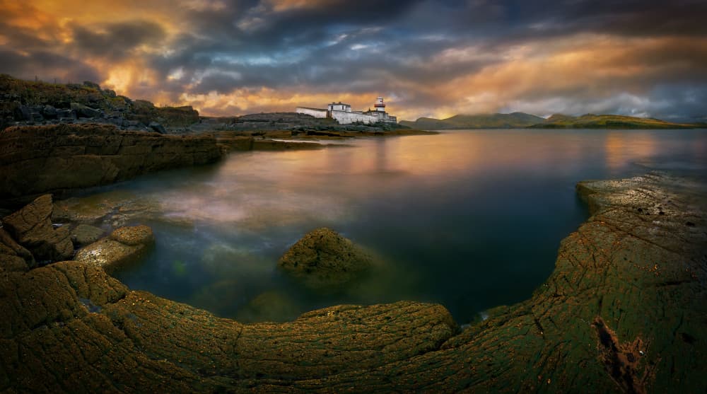 Dramatic Lighthouse Coast by Krzysztof Browko — canvas wall art