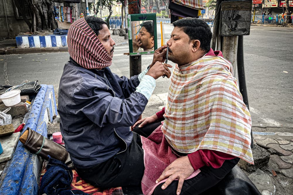 Street Barber Scene by Subhajit Das — canvas wall art