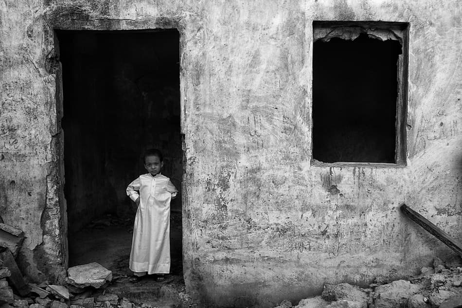 Solemn Child Doorway by Hesham Alhumaid — canvas wall art