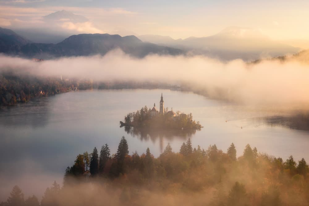 Serene Lake Bled Sunrise by Daniel Gastager — canvas wall art