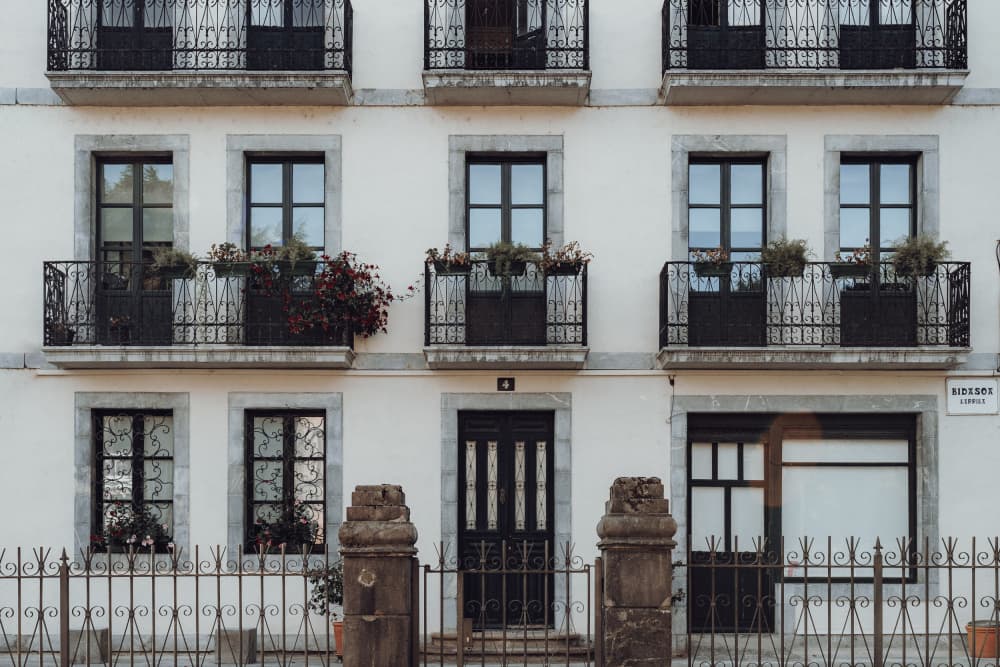 White Balcony Windows by Aimee Giles — canvas wall art